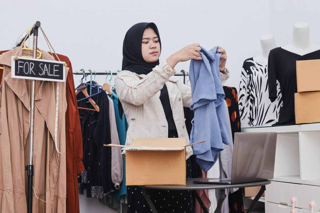 Young muslim business woman owner of SME online