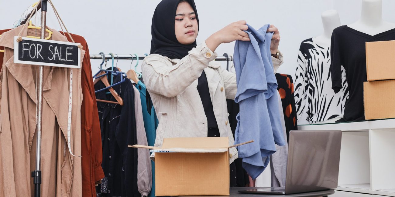 Young muslim business woman owner of SME online